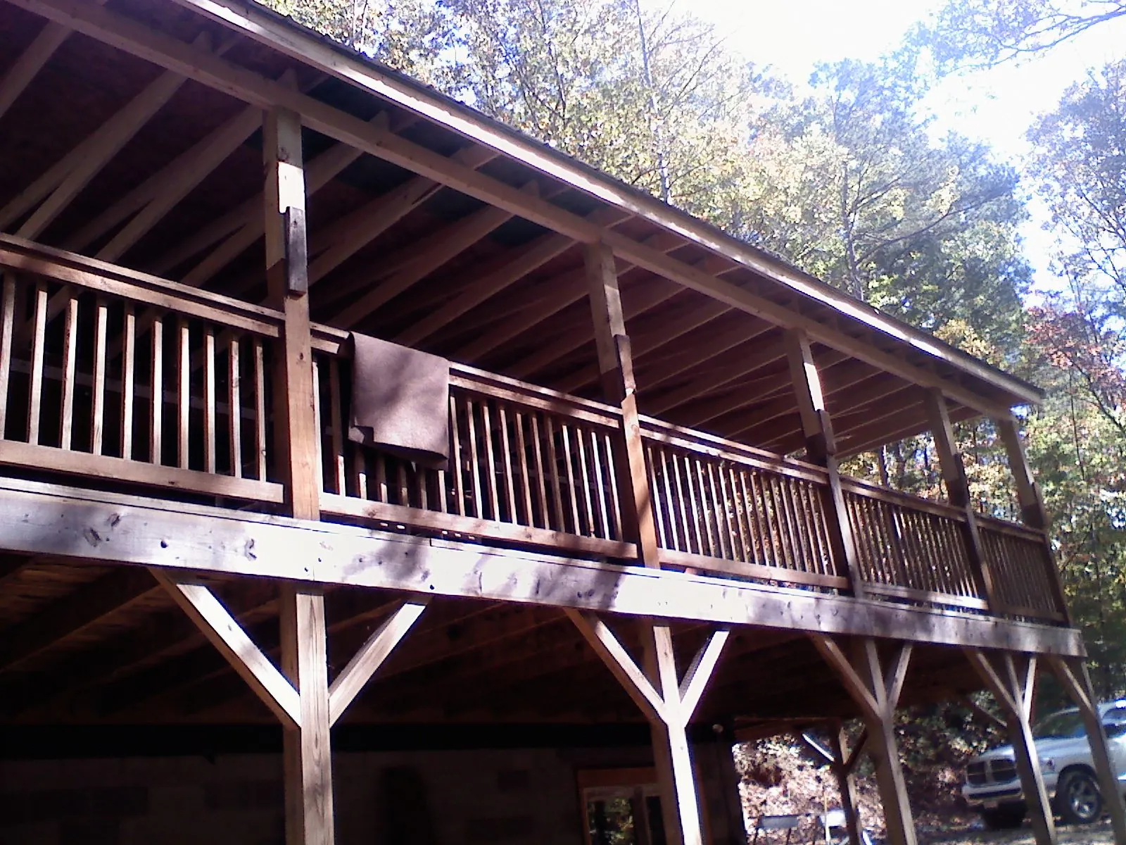 Timber framing under a new elevated porch and deck — Roof Leak Repair in Merrick by Roofing Brothers